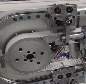 Precision circular guide rail conveyor system with multi-station layout.png