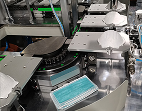 Precision circulating conveyor system used in medical device manufacturing
